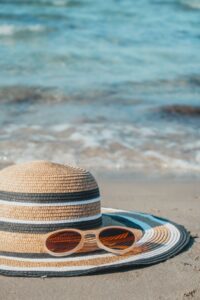 Protective gear like wide-brim hats can help ward off skin cancer and aging concerns.